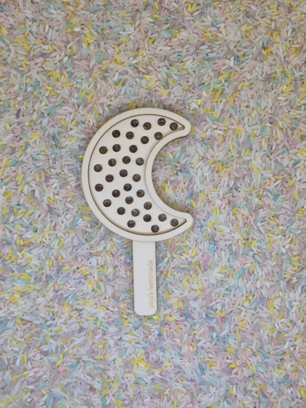 Zeefje maan op speelrijst Zeefje maan op speelrijst