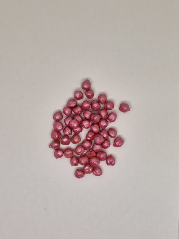 Losse roze sensorische kikkererwten voor sensorische speelbak