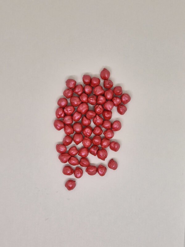 Losse rode sensorische kikkererwten voor sensorische speelbak